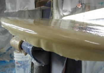 mending surfboard
