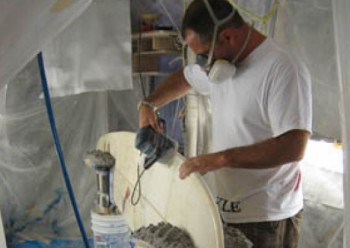 sanding surfboard